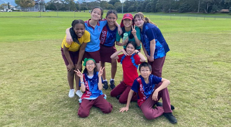 Students smiling together at their sport carnival at St Bernadette's Primary School Dundas Valley