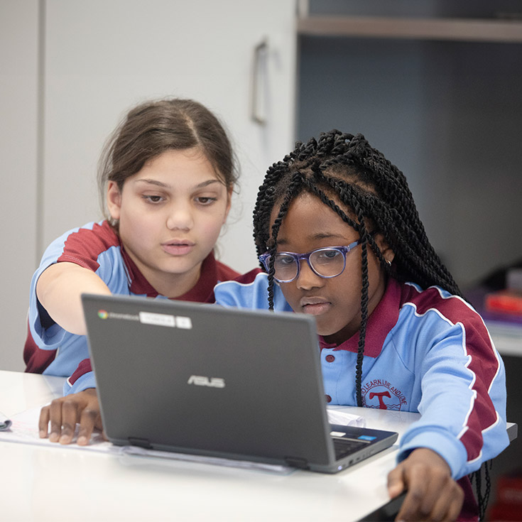 Students working on their laptops in the classroom at St Bernadette's Primary School Dundas Valley